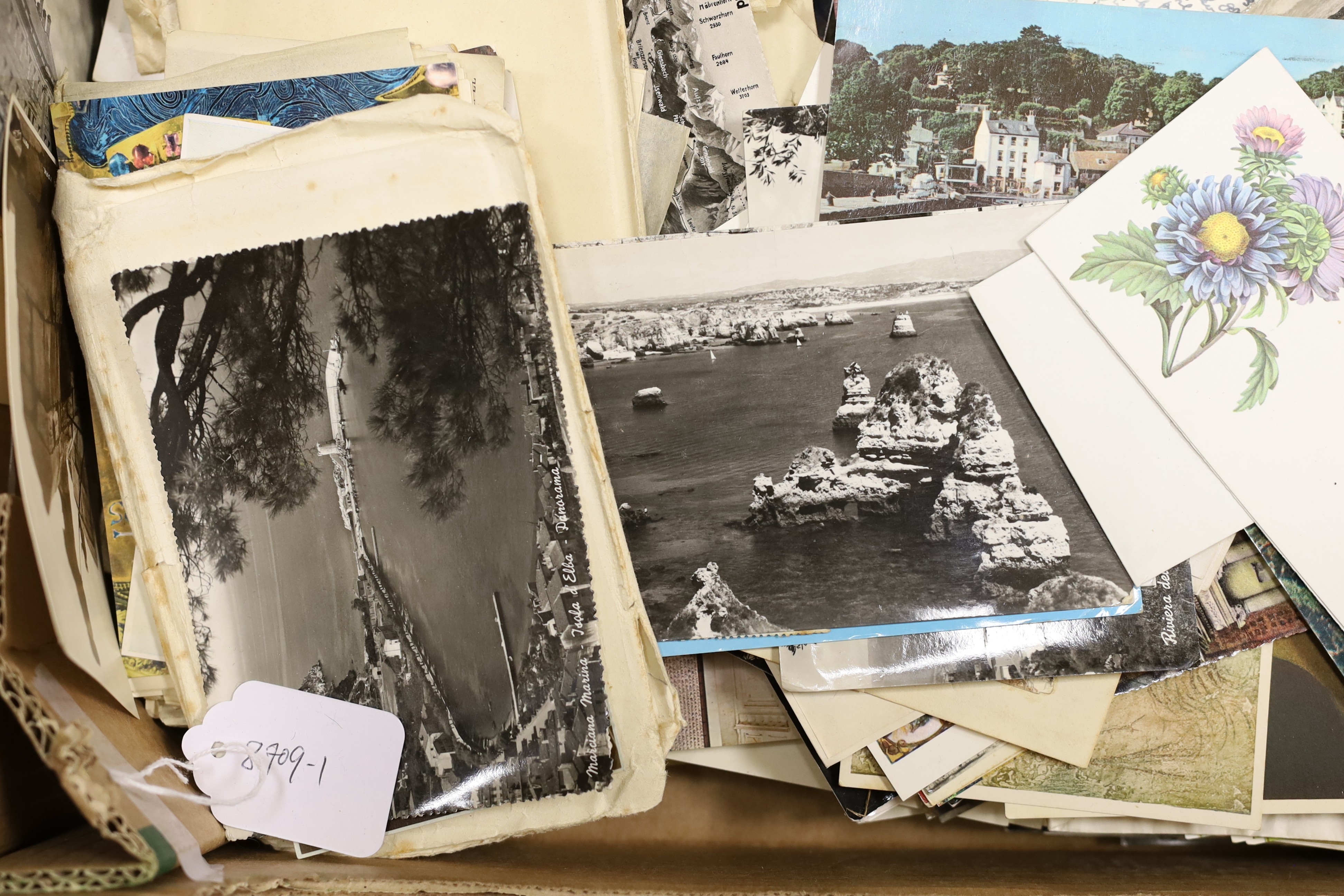 A quantity of postcards photos